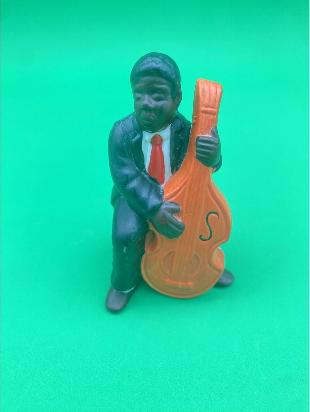 Vintage 3.5" Ceramic Seated Bassist Figurine
